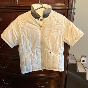 NIKE jacket it is reversible and has pockets on both sides.